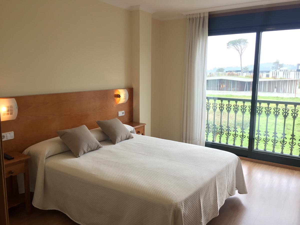 Hostal Santa Baia Ribadumia Bagian luar foto