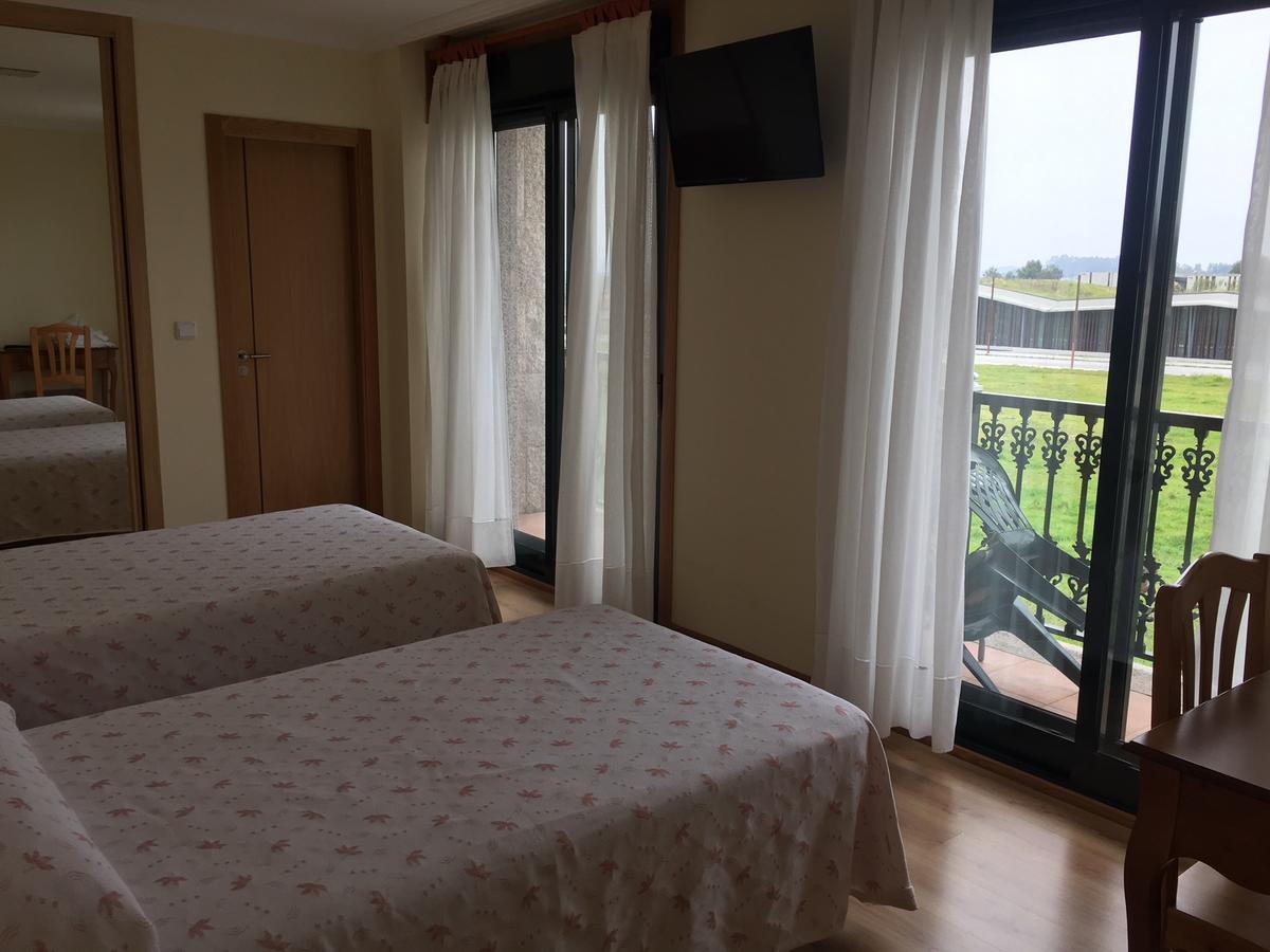 Hostal Santa Baia Ribadumia Bagian luar foto